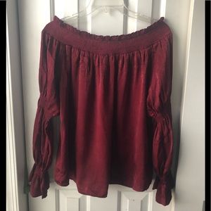 Deep red off shoulder or on shoulder blouse